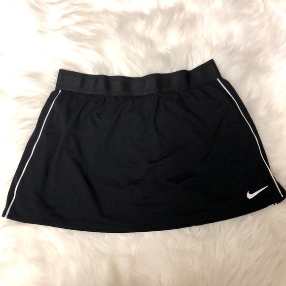 Nike Dresses & Skirts - A cute Nike swim shirt